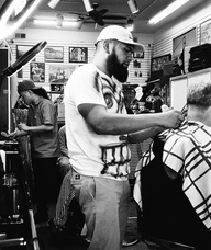 Book an Appointment with lulu your barber for Haircut w/ razor finish